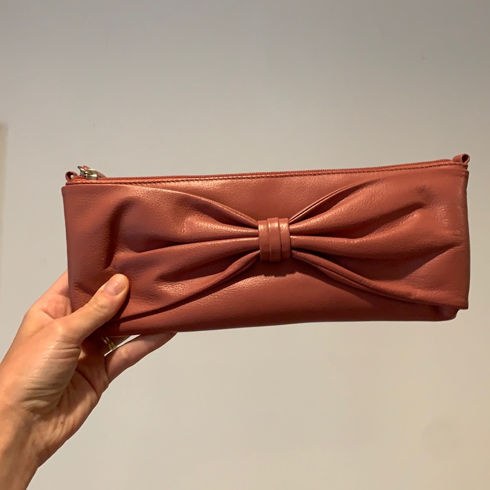 Barney’s New York leather bow clutch